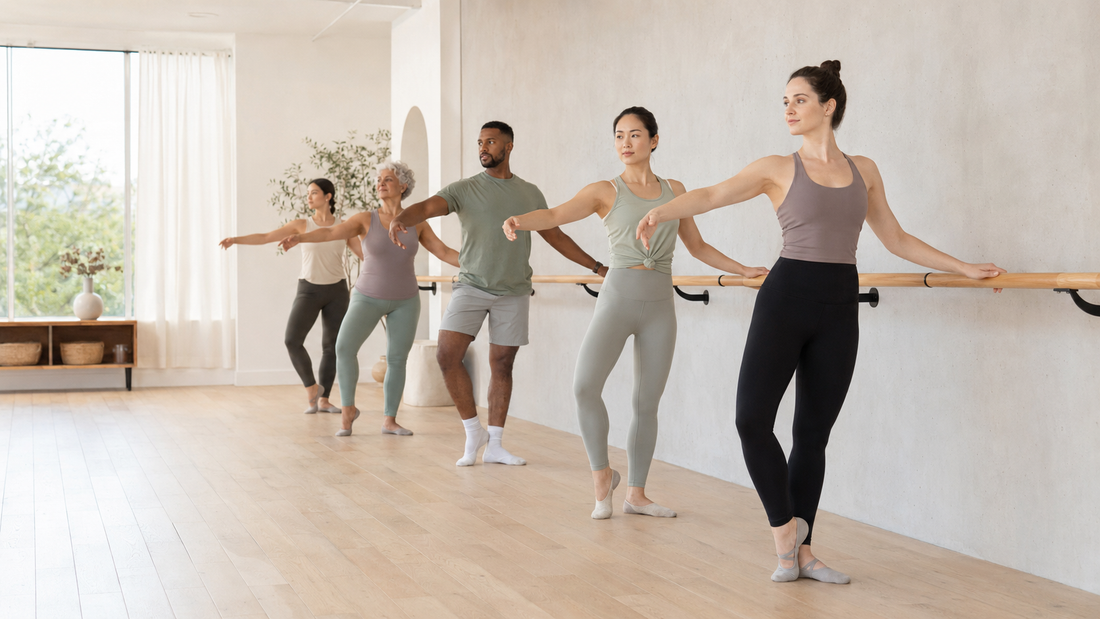 Diverse adults attending a bright beginner barre class