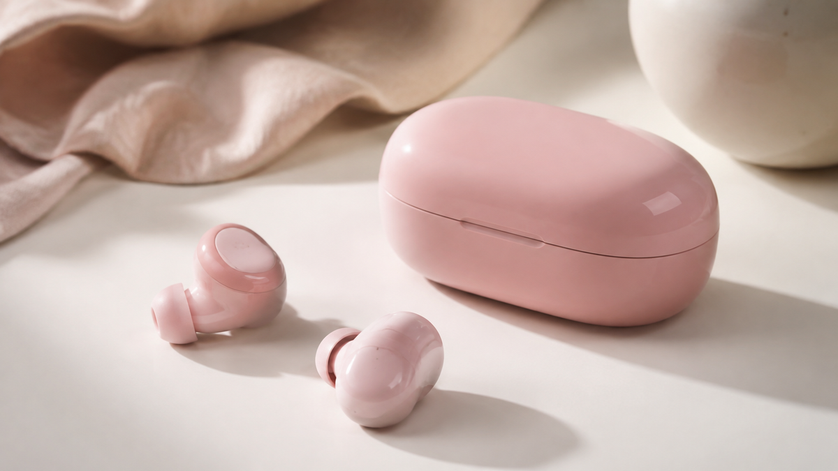 Generic pink wireless earbuds with a matching charging case