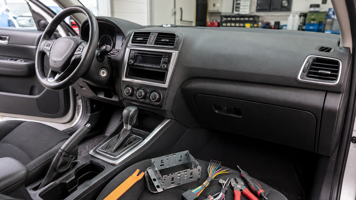 Unbranded car audio dashboard and professional installation tools