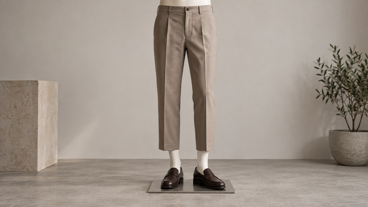 Cropped trousers demonstrating hem length rise and drape