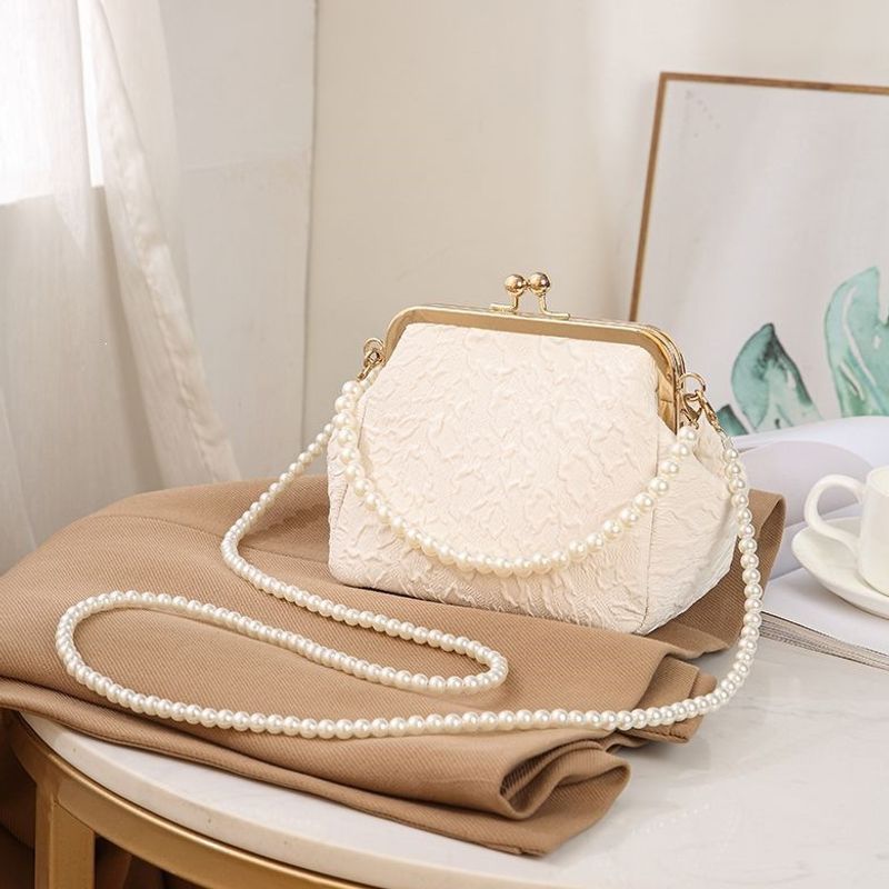 Mini shell-shaped jewelry charm handbag made