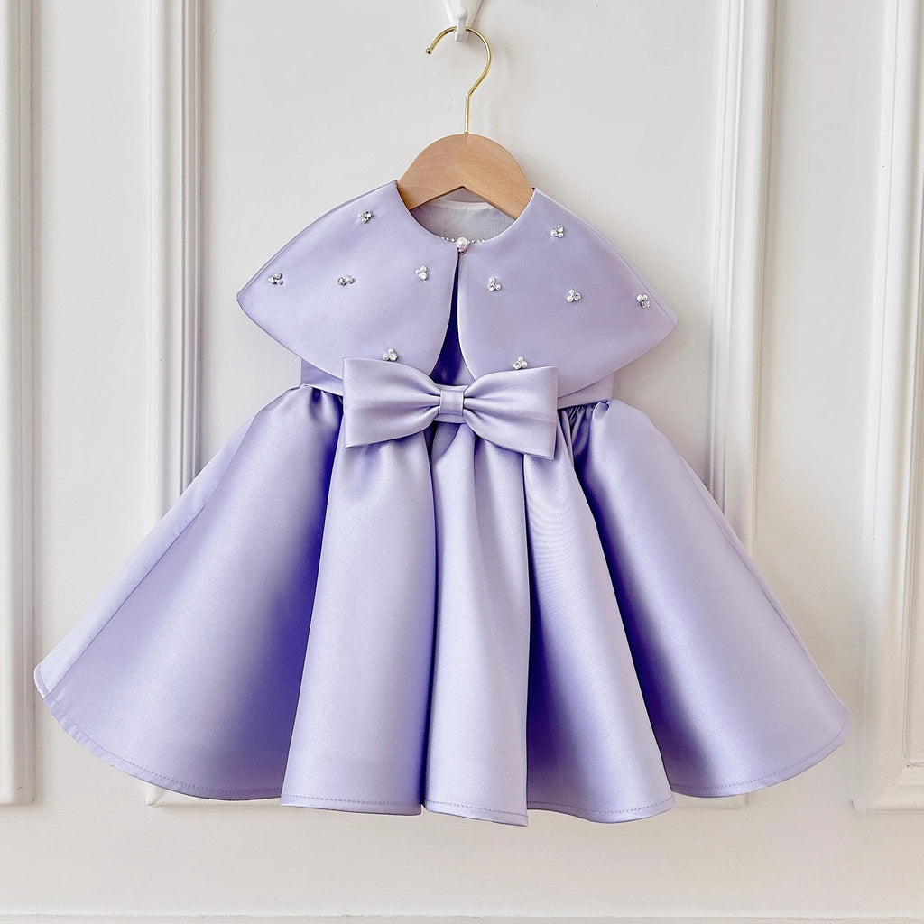 Children's formal dress in purple
