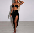 Strapless, slit and body-hugging skirt