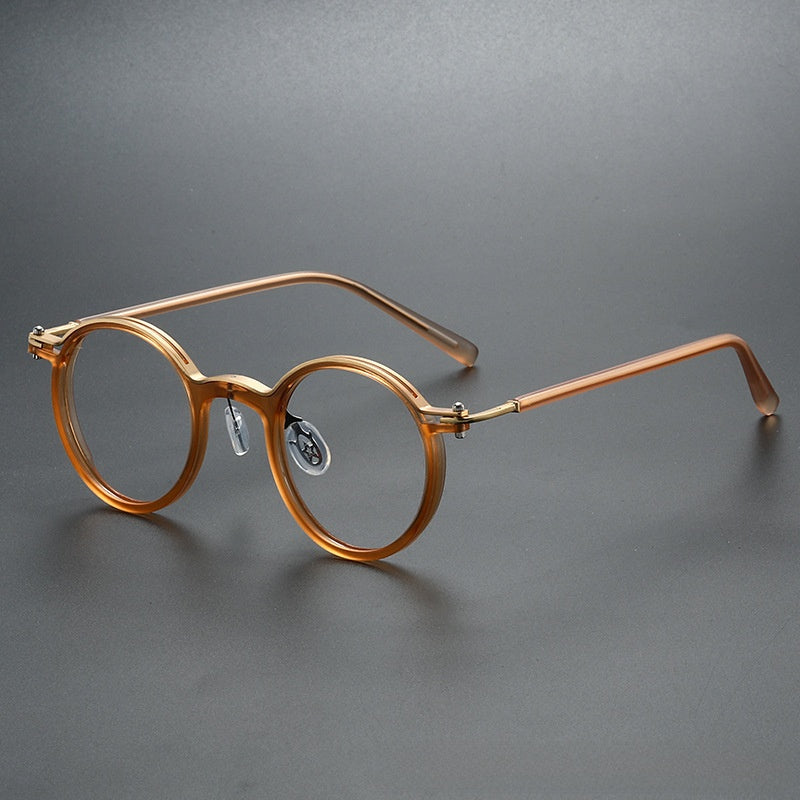 Round-framed metal spectacle frames