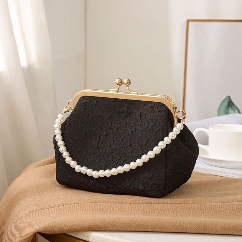 Mini shell-shaped jewelry charm handbag made