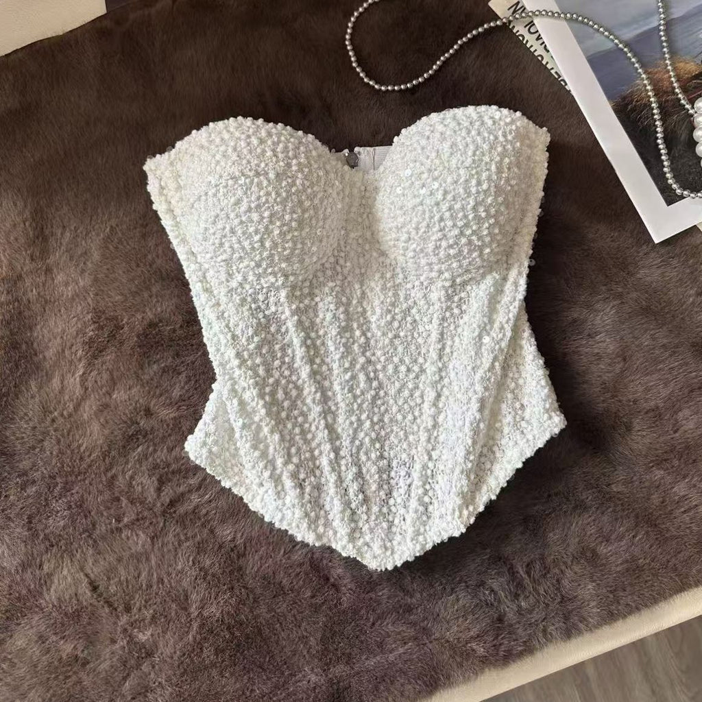White three-dimensional racerback top