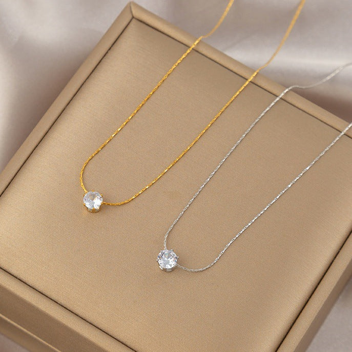 Six-prong diamond pendant necklace
