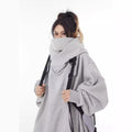 Coat with high collar, hood and fleece-lined sweater