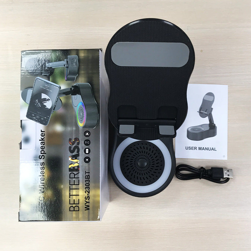 Inductive phone holder with speaker