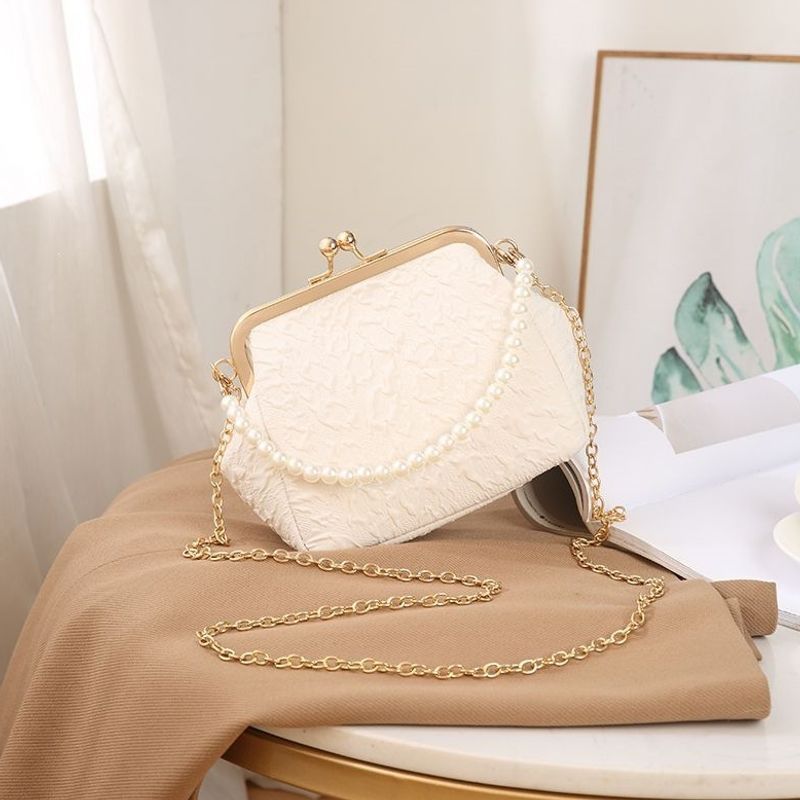 Mini shell-shaped jewelry charm handbag made