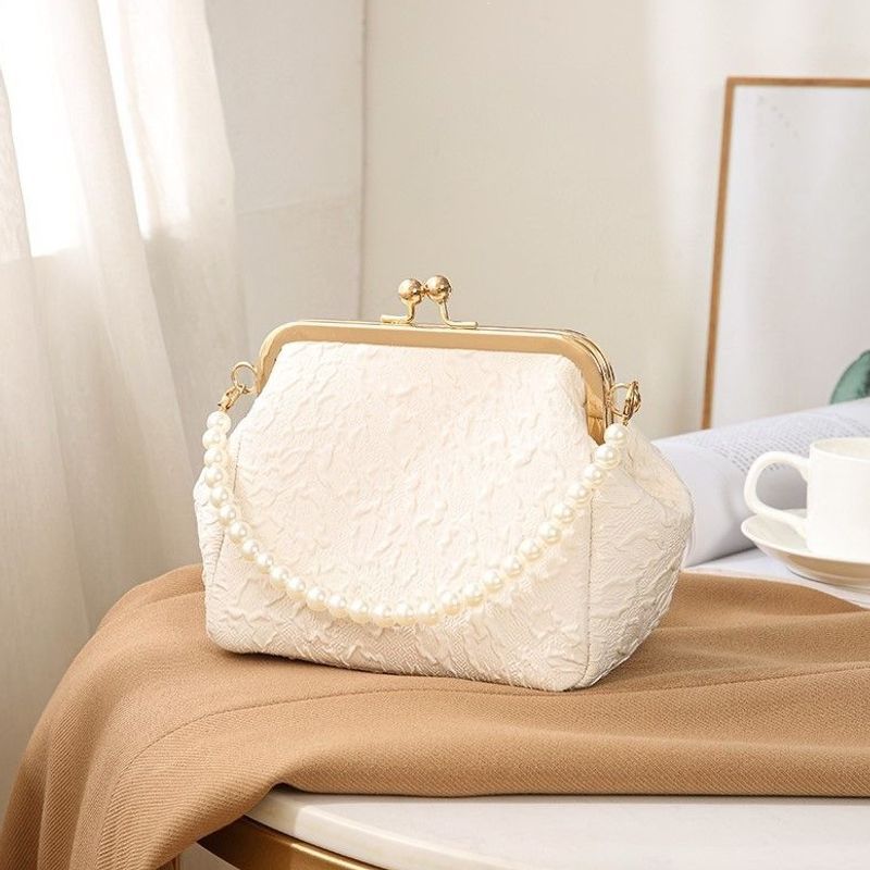 Mini shell-shaped jewelry charm handbag made