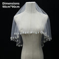 The bridal pearl tassel veil with lampshade-style wedding photography props