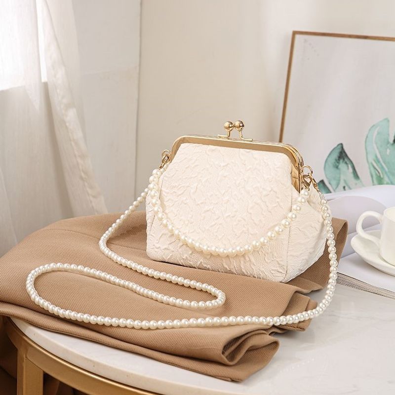 Mini shell-shaped jewelry charm handbag made