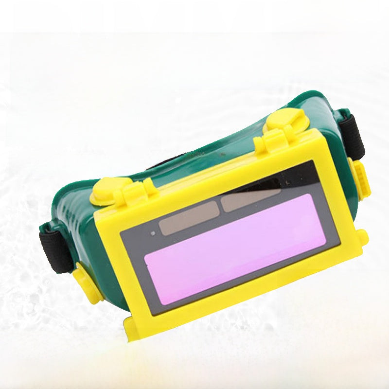 Automatic light changing electric welding glasses