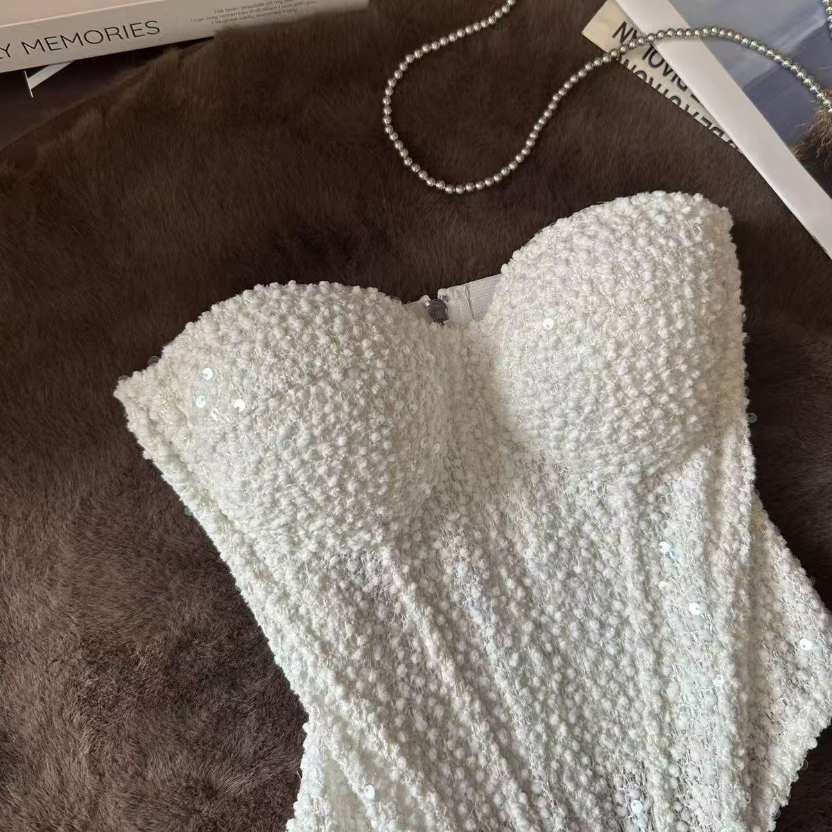 White three-dimensional racerback top