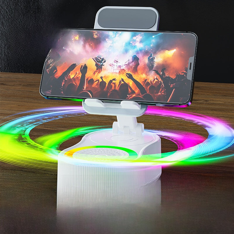 Inductive phone holder with speaker