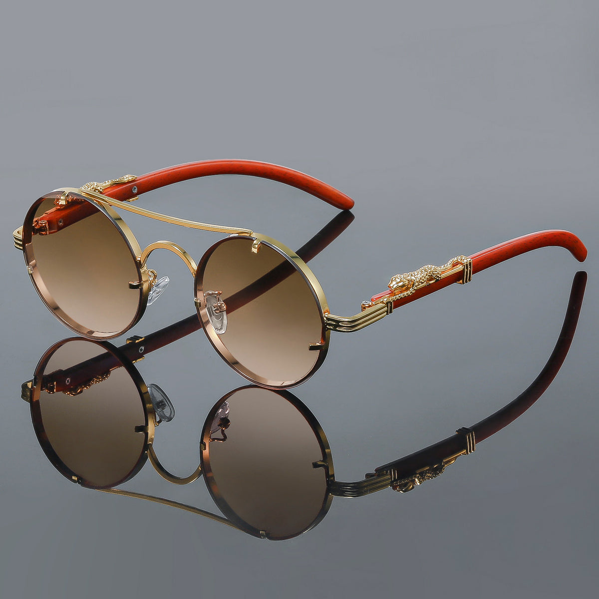 Retro Metal Round Sunglasses with Leopard Head Design