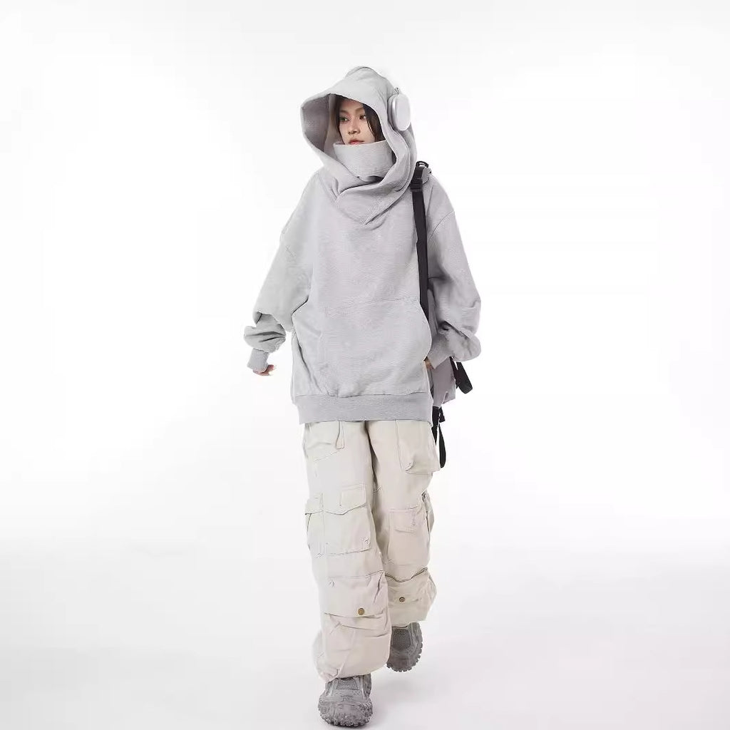 Coat with high collar, hood and fleece-lined sweater