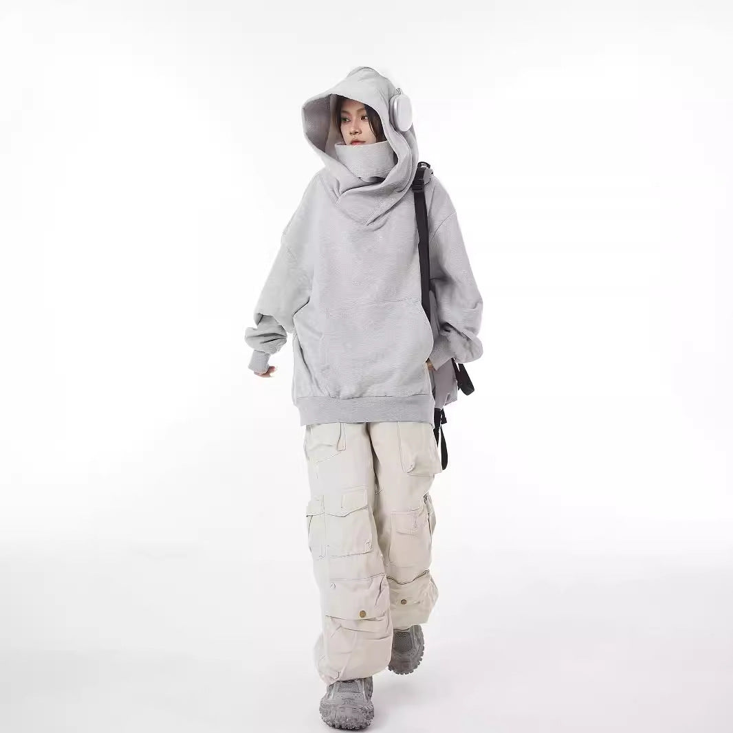 Coat with high collar, hood and fleece-lined sweater