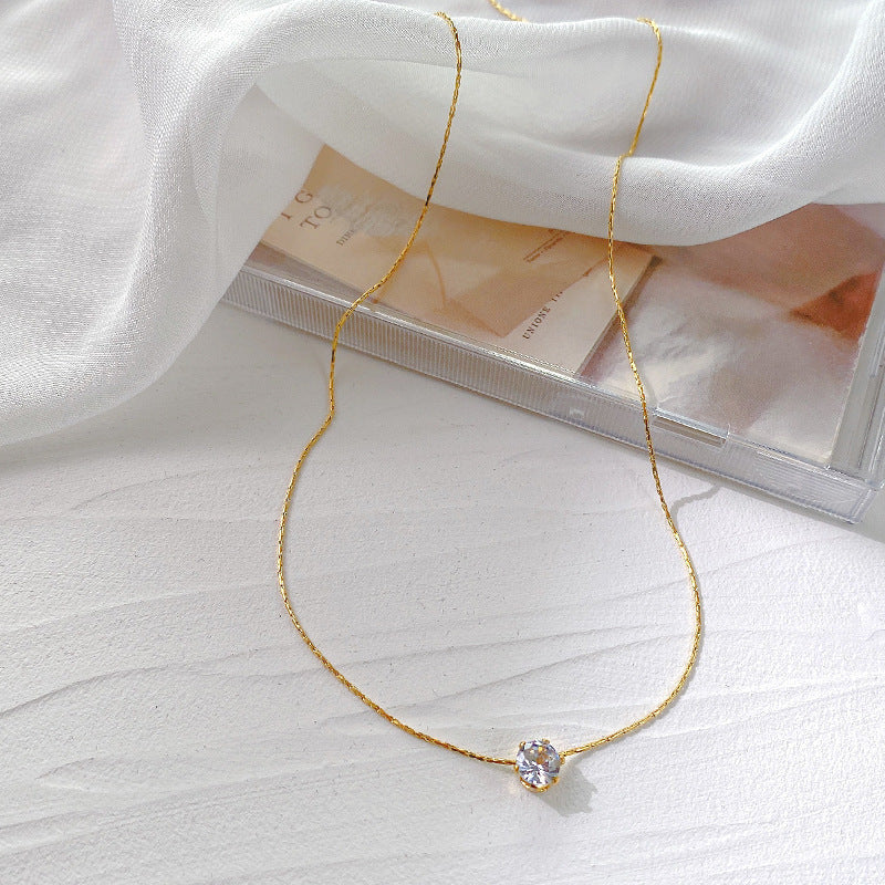 Six-prong diamond pendant necklace