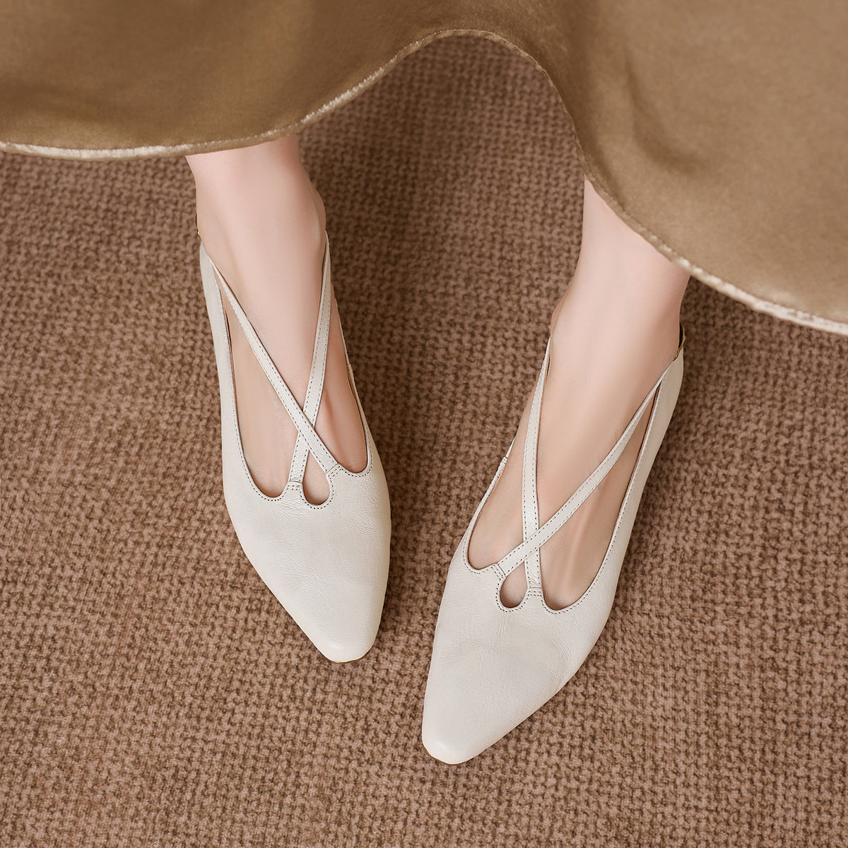 Kitten-heel peep-toe pumps with a crossover strap