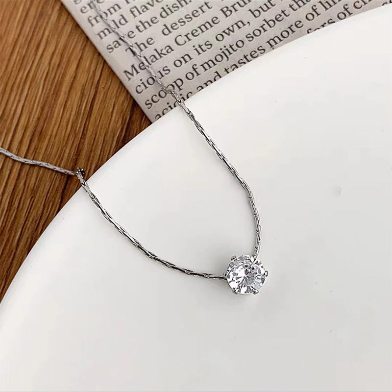 Six-prong diamond pendant necklace