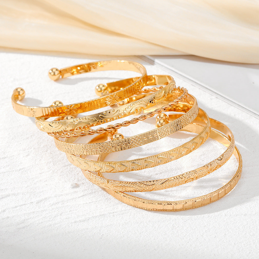 7-Piece Braided Open Bracelet Set with Star and Geometric Patterns