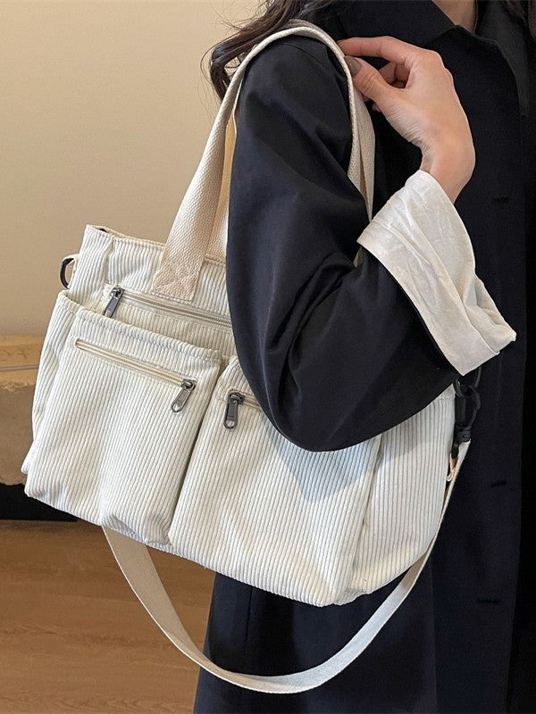 Large-capacity pile fabric shoulder bag for traveling