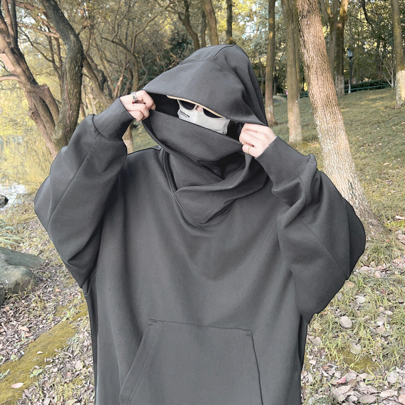 Coat with high collar, hood and fleece-lined sweater