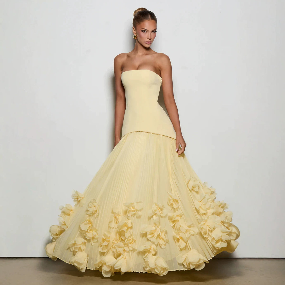 Strapless and figure-hugging long evening dress