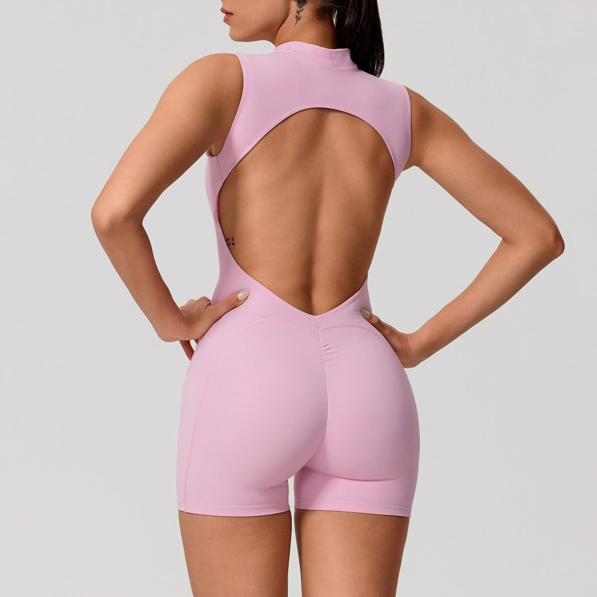 Sleeveless Backless Yoga Jumpsuit with Removable Chest Pads and Peach Butt Design