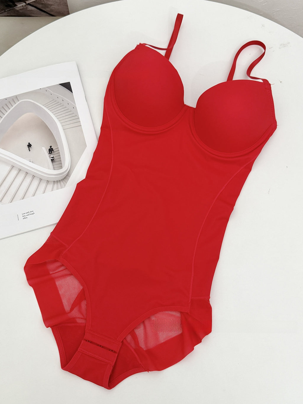 Thong-style one-piece shaping garment