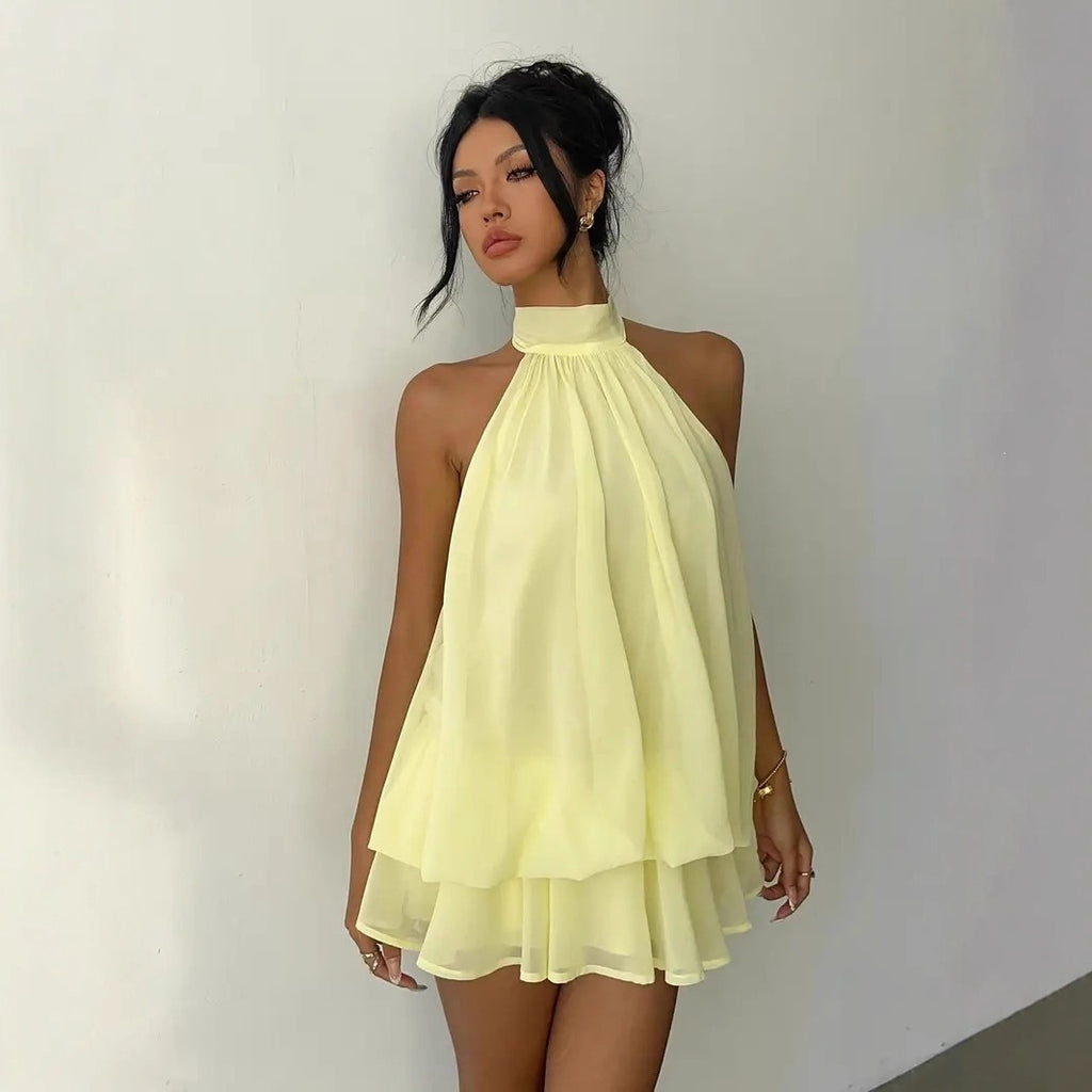 Slim-fit, sexy backless halter top with waist-cinching tie and sleeveless short skirt