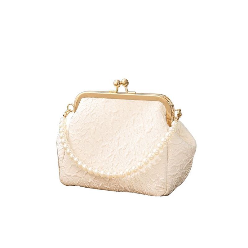 Mini shell-shaped jewelry charm handbag made