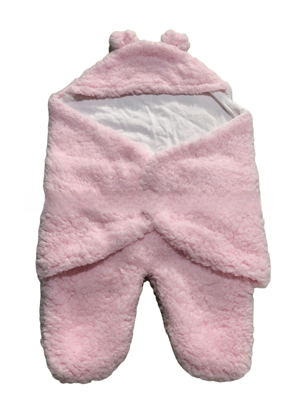 newborn hugging clothing package
