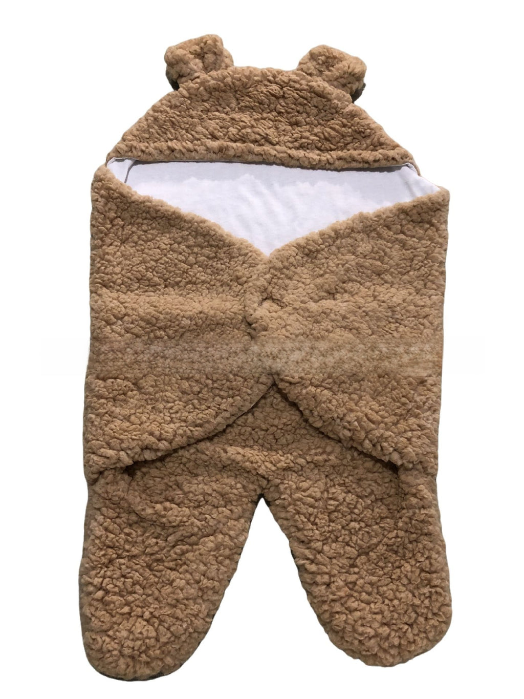 newborn hugging clothing package