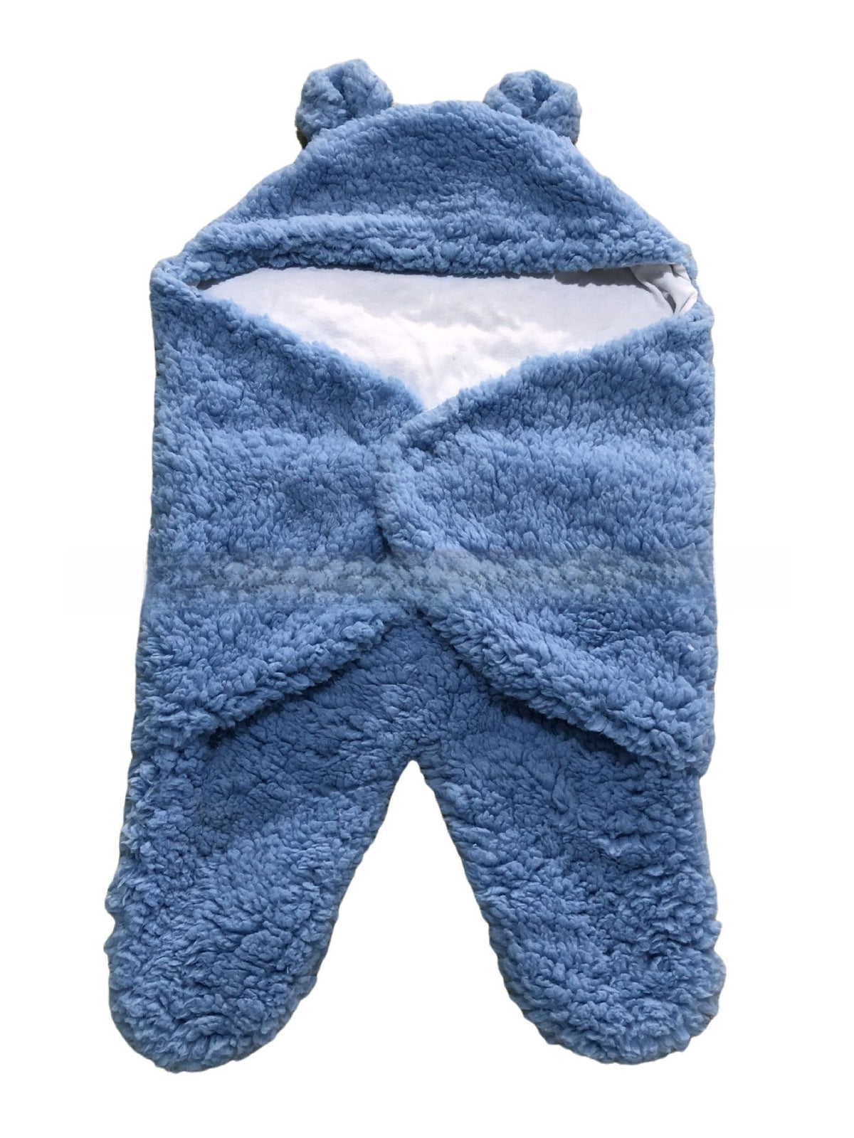 newborn hugging clothing package