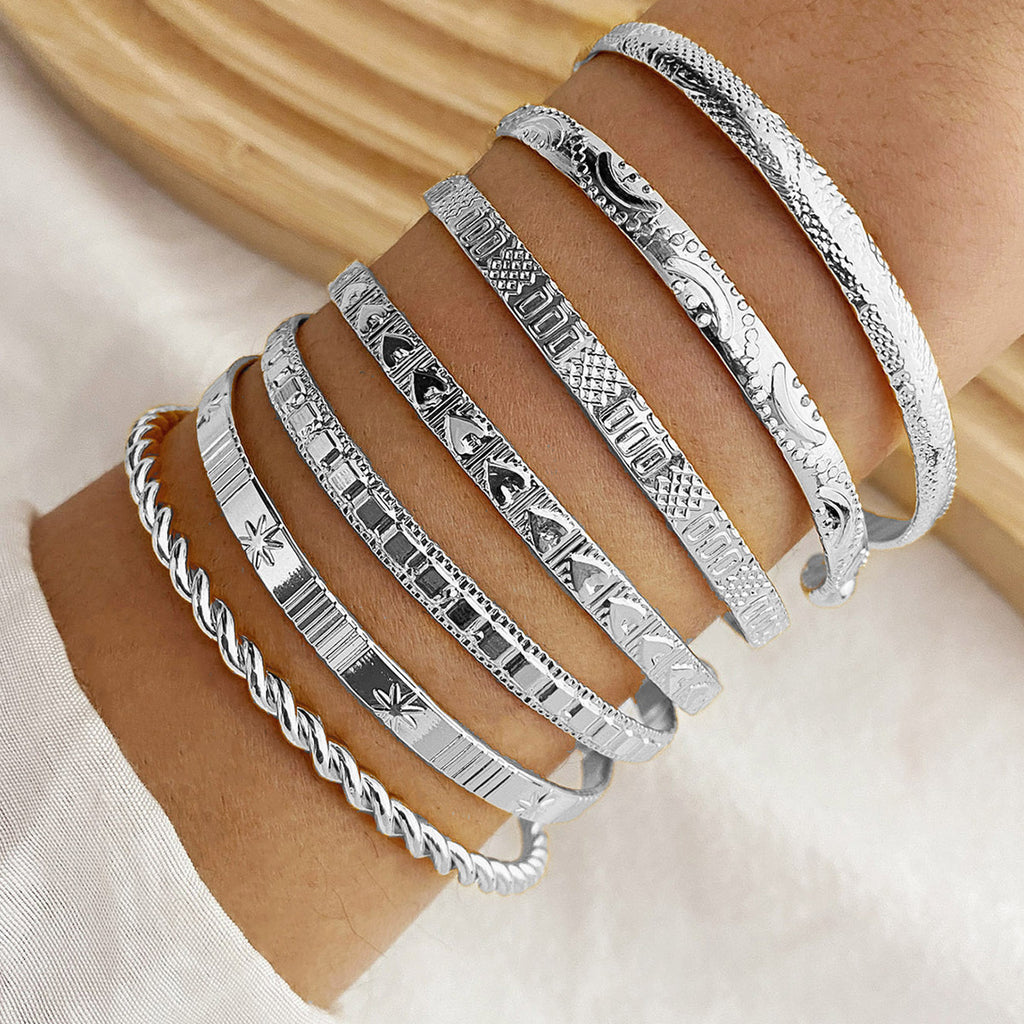 7-Piece Braided Open Bracelet Set with Star and Geometric Patterns