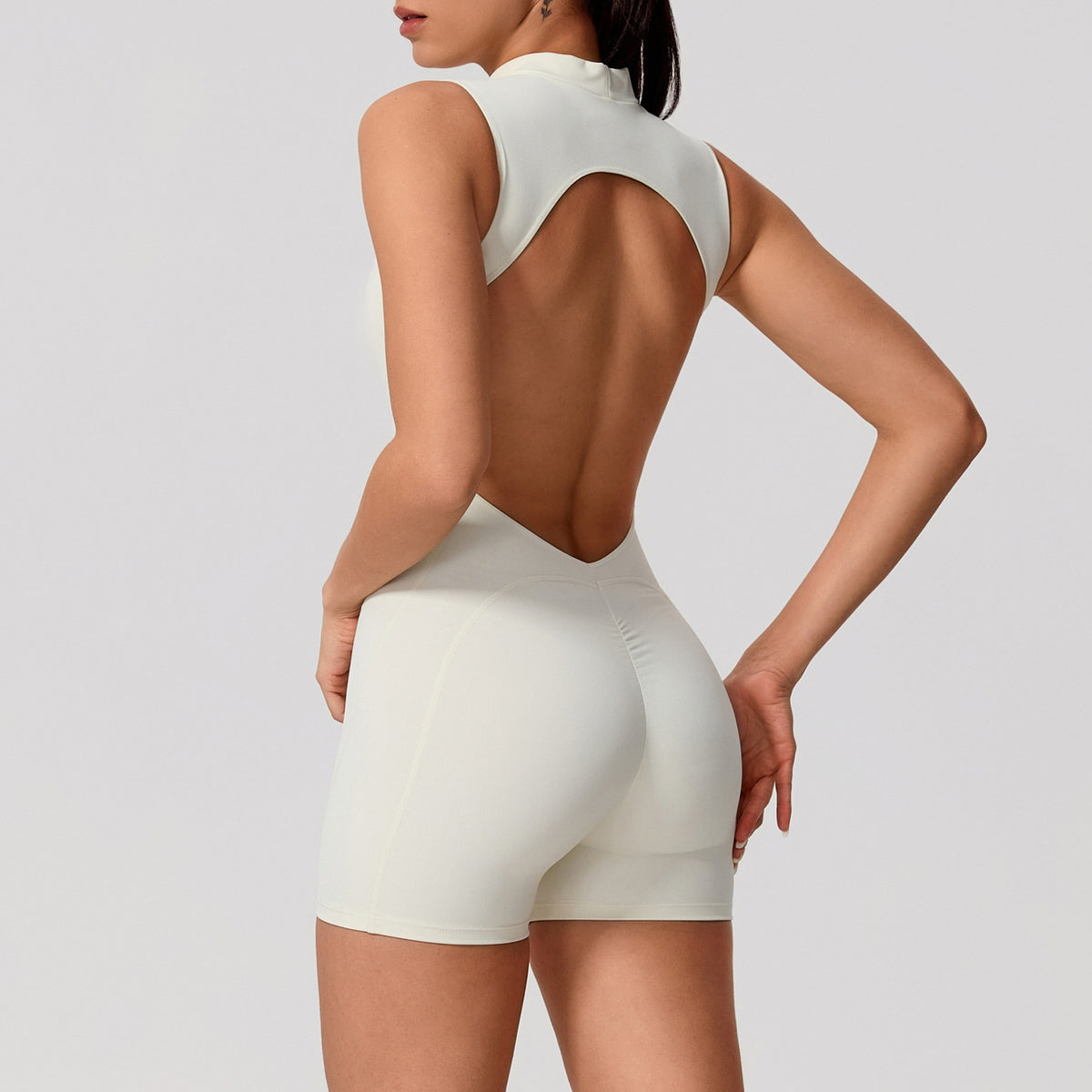 Sleeveless Backless Yoga Jumpsuit with Removable Chest Pads and Peach Butt Design