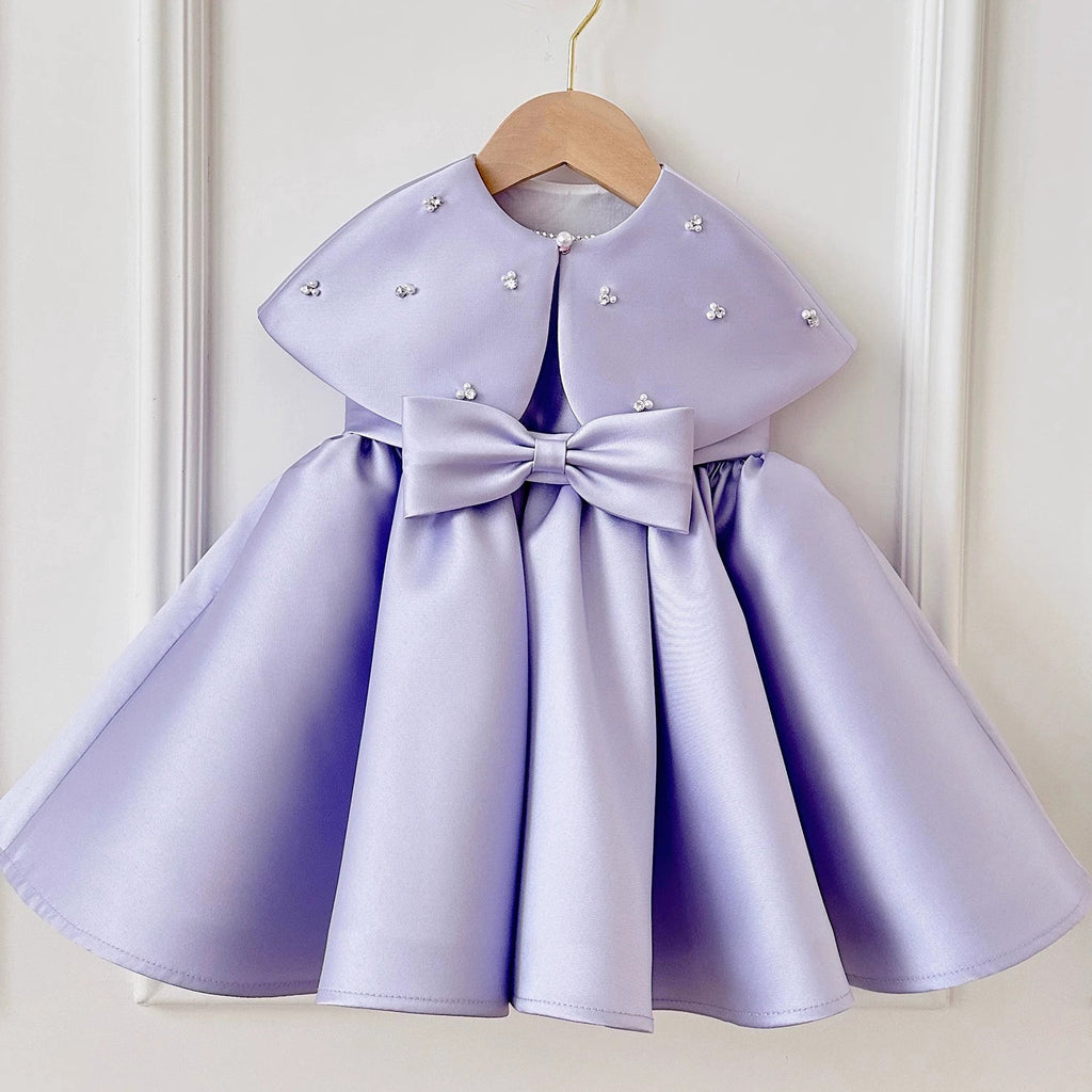 Children's formal dress in purple
