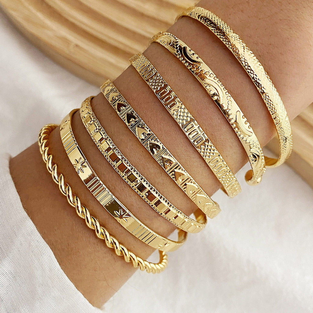 7-Piece Braided Open Bracelet Set with Star and Geometric Patterns