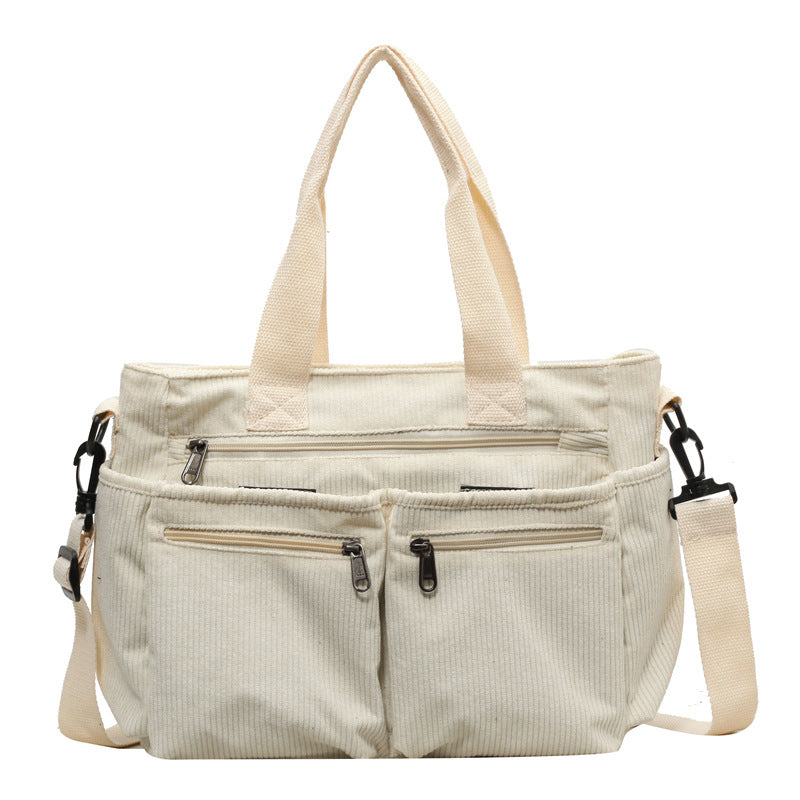 Large-capacity pile fabric shoulder bag for traveling