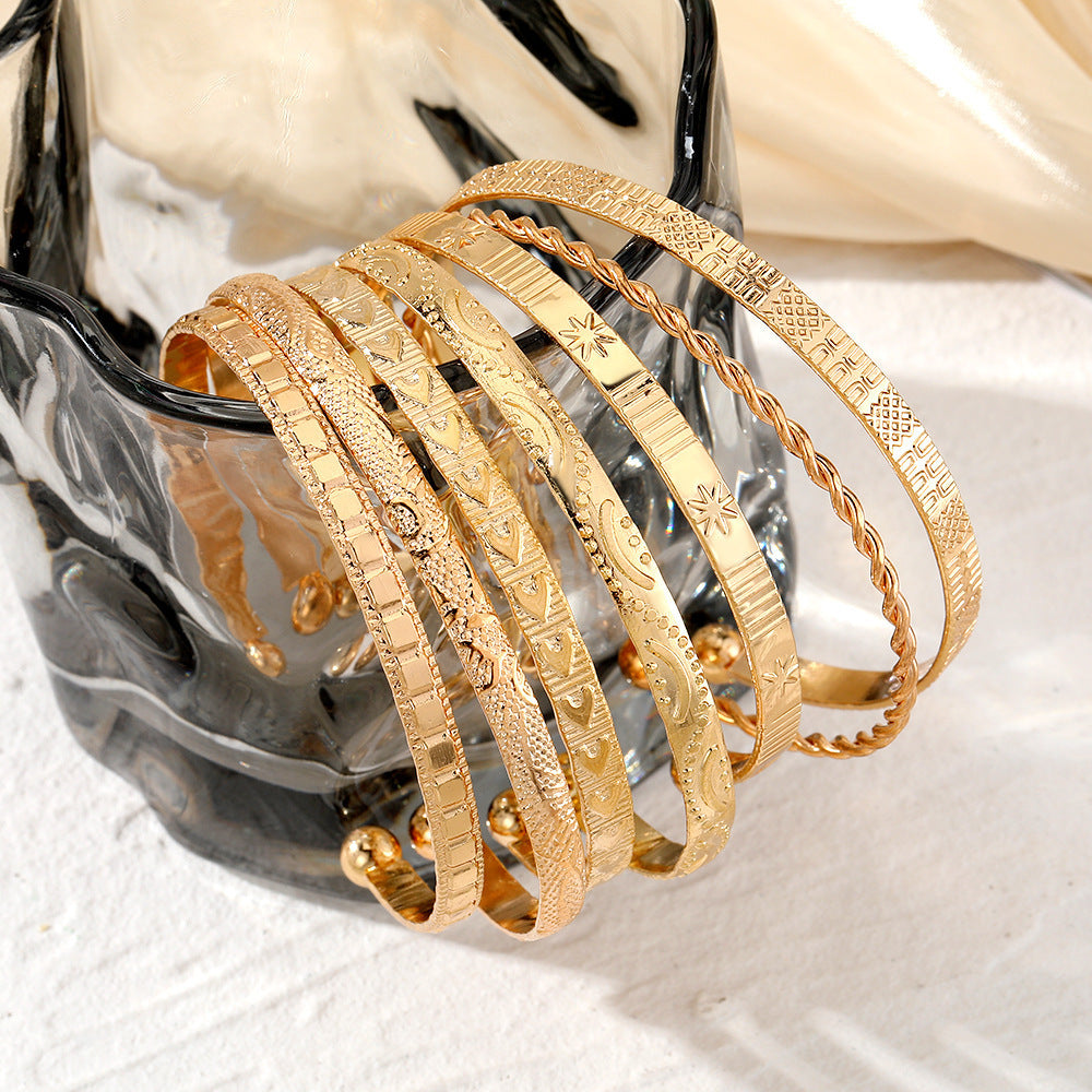 7-Piece Braided Open Bracelet Set with Star and Geometric Patterns