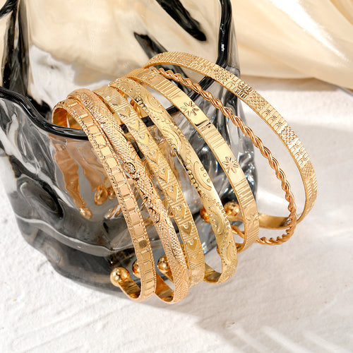 7-Piece Braided Open Bracelet Set with Star and Geometric Patterns