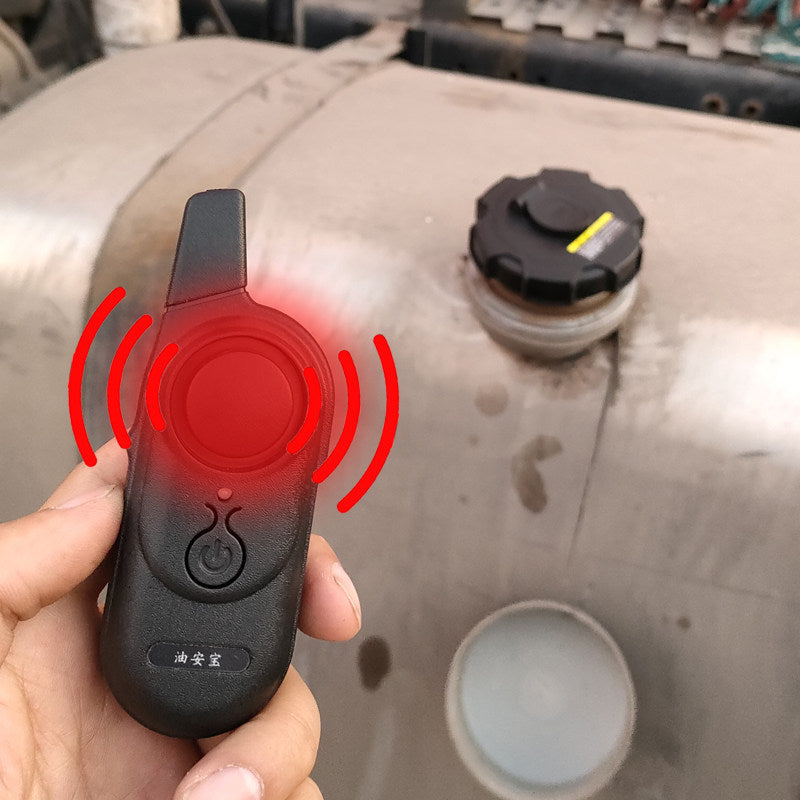 Anti-theft alarm for large truck fuel tanks
