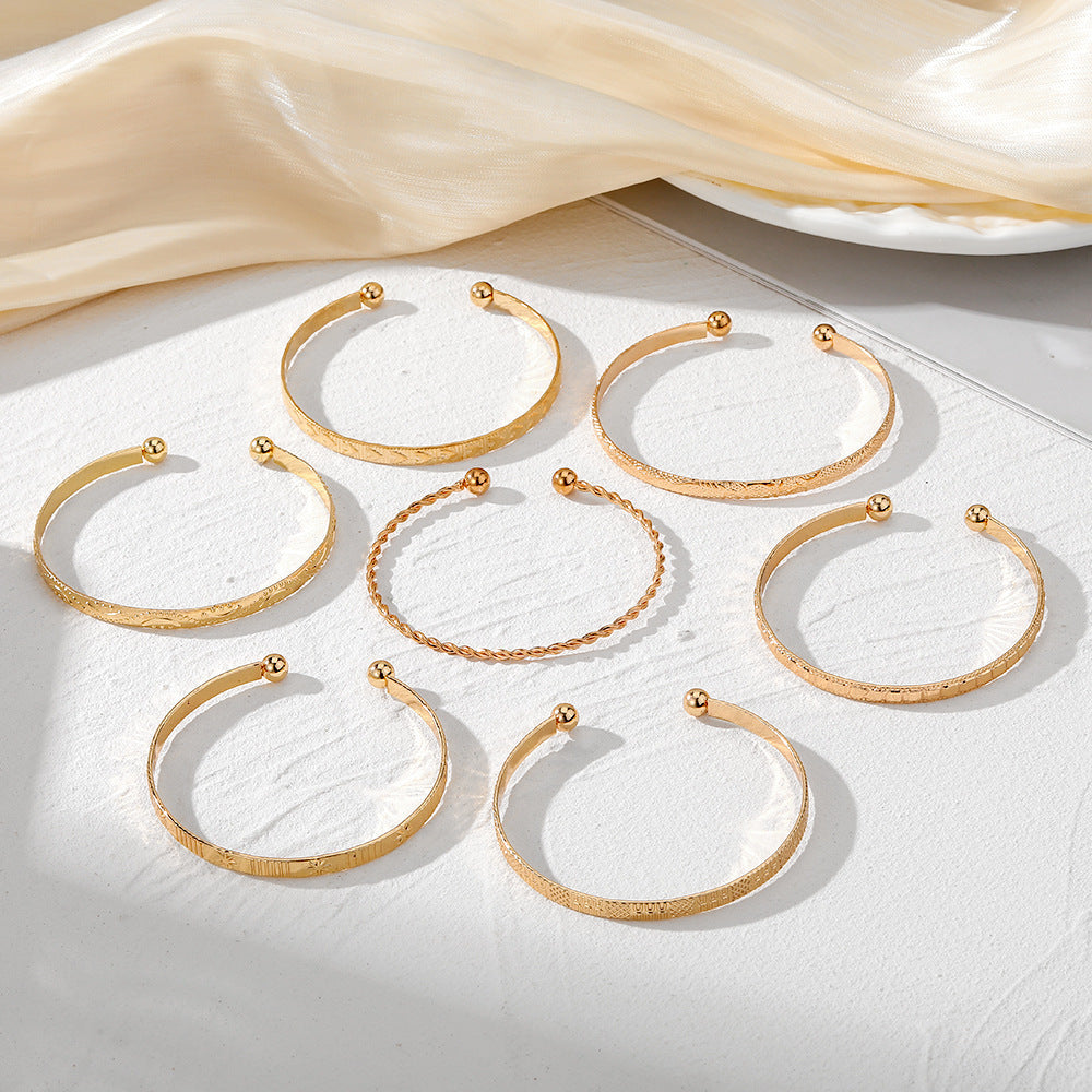 7-Piece Braided Open Bracelet Set with Star and Geometric Patterns