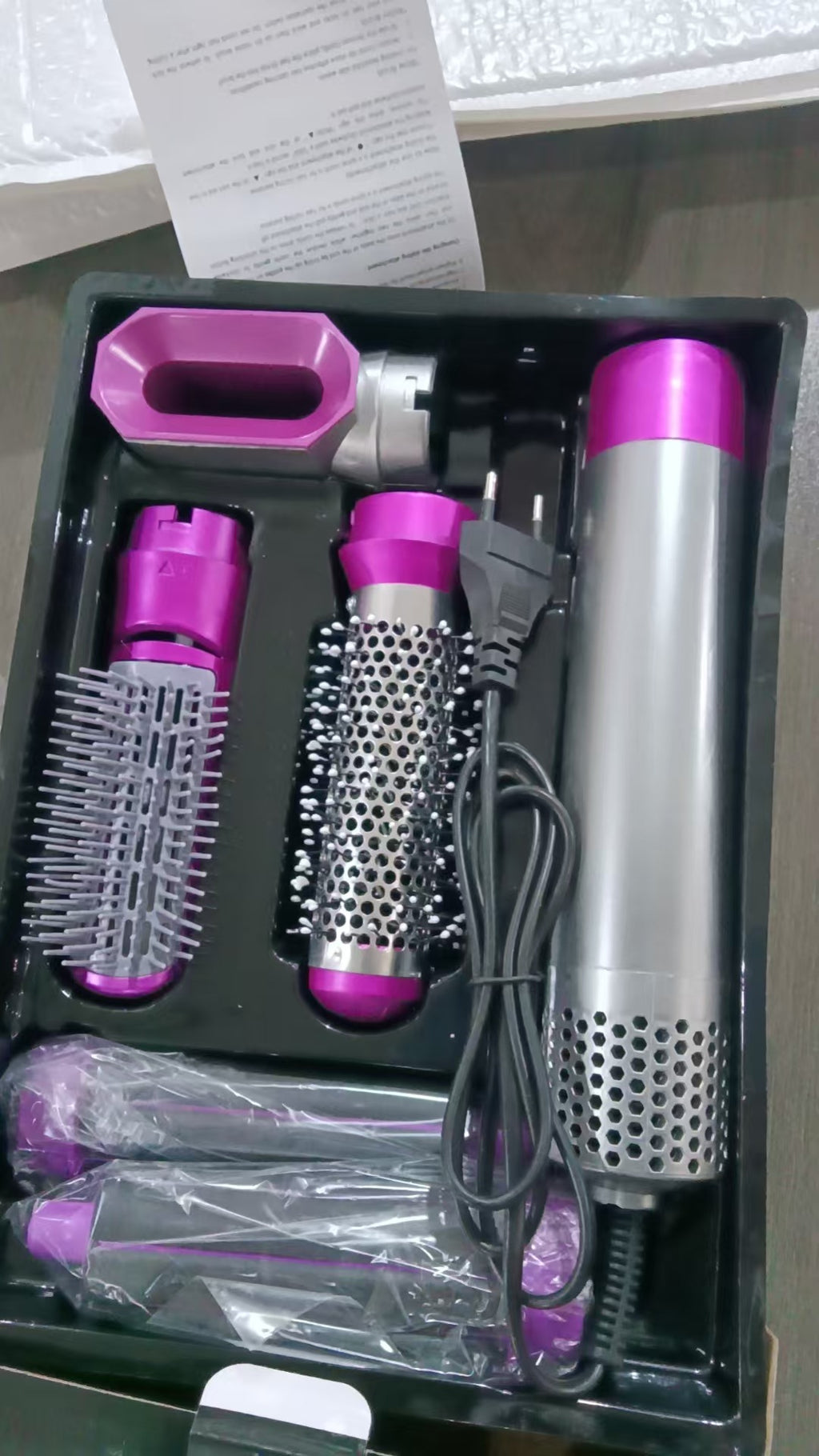 Multi-Function Hair Styler with Automatic Suction