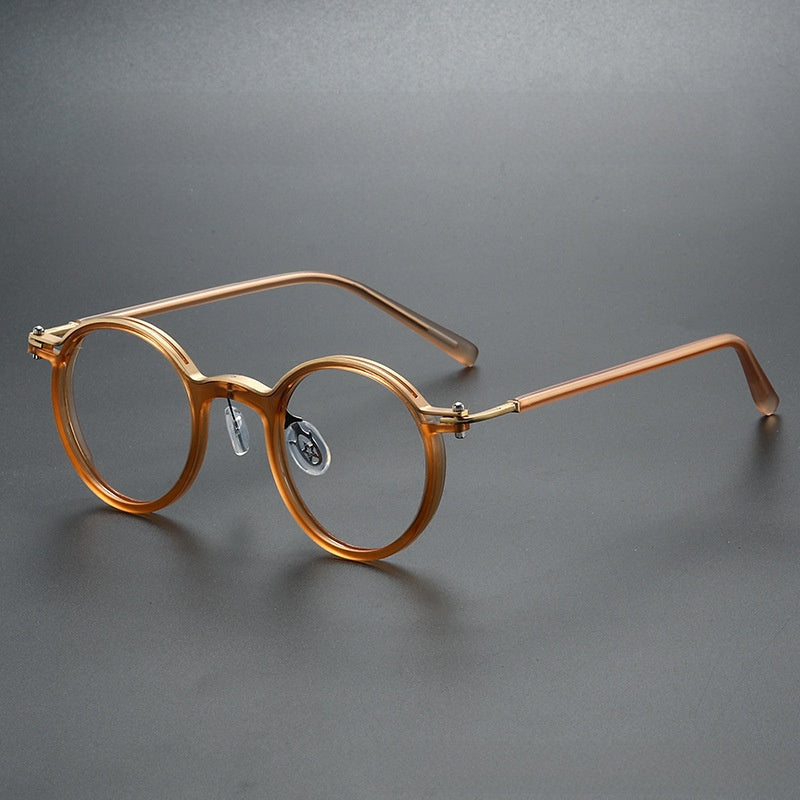 Round-framed metal spectacle frames