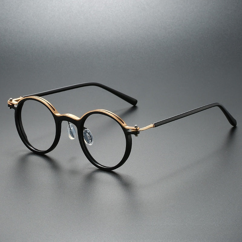 Round-framed metal spectacle frames