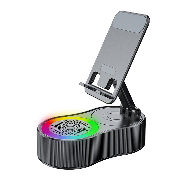 Inductive phone holder with speaker
